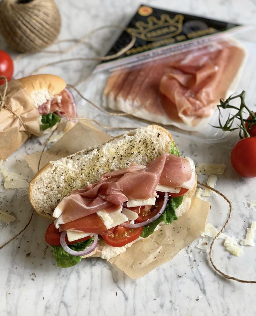Italian Sub Sandwich with Prosciutto di Parma, Salad, and Cheese - An easy to prepare "long sandwich" that would be great for outdoor dining and picnics.